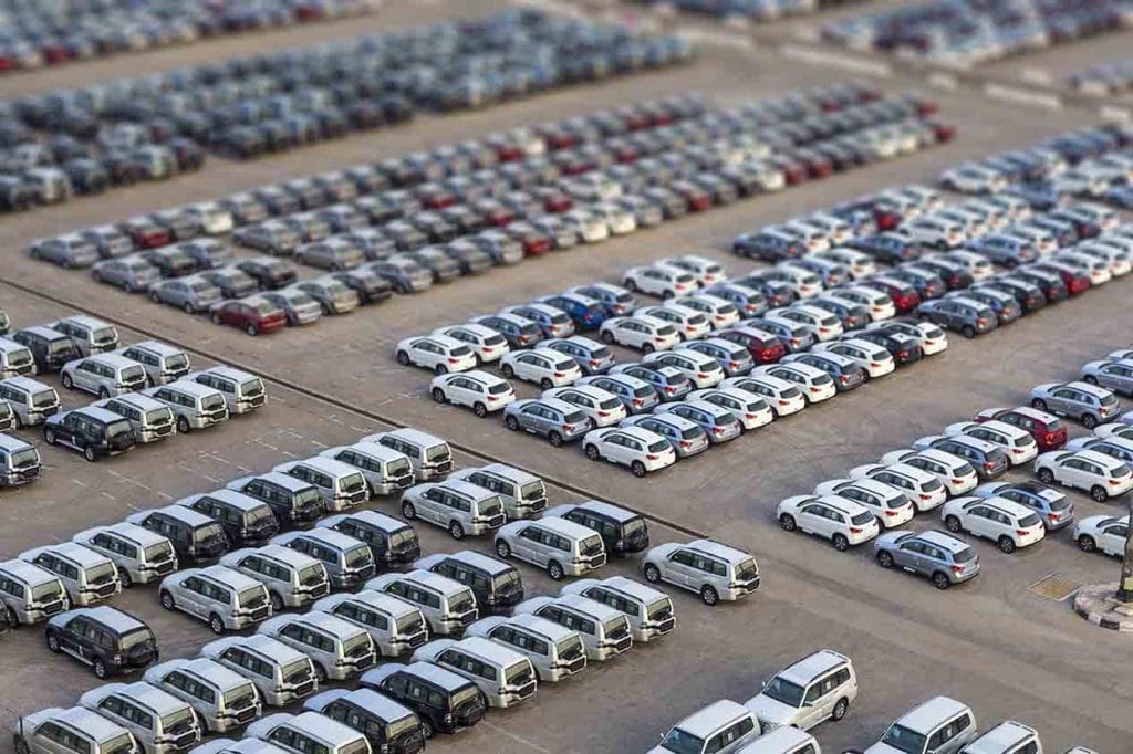 Dubai, UAE - January 03, 2017: New cars in rows stored at port-linxio